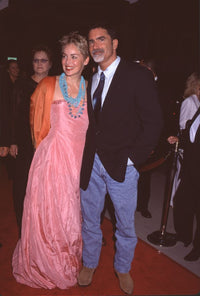 Sharon Stone in pink gown and orange shawl with Phil Bronstein in jeans at The Muse premiere photo print.