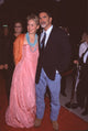 Sharon Stone in pink gown and orange shawl with Phil Bronstein in jeans at The Muse premiere photo print.