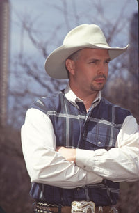 Garth Brooks close up photo print in plaid shirt and cowboy hat.