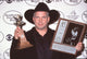 Garth Brooks holding award at the 34th Academy Country Music Awards Photo Print