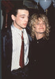 Jason Gedrick in striped shirt with red tie and Meg Ryan in black dress 1988 photo print