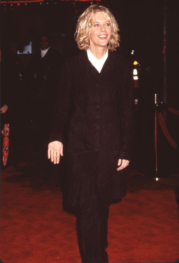 Meg Ryan in a long black coat and white collar shirt at the Hanging Up premiere photo print.