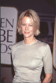 Close-up photo print of Meg Ryan at the 56th Golden Globe Awards wearing a tan short sleeve shirt.