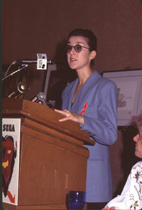 Celine Dion speaking at podium photo print