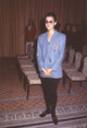 Celine Dion photo print in black pants and blue blazer, capturing her elegance.