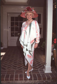 Phyllis Diller in white flowy dress and large pink floral hat photo print