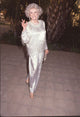 Phyllis Diller in a silver tinsel outfit photo print