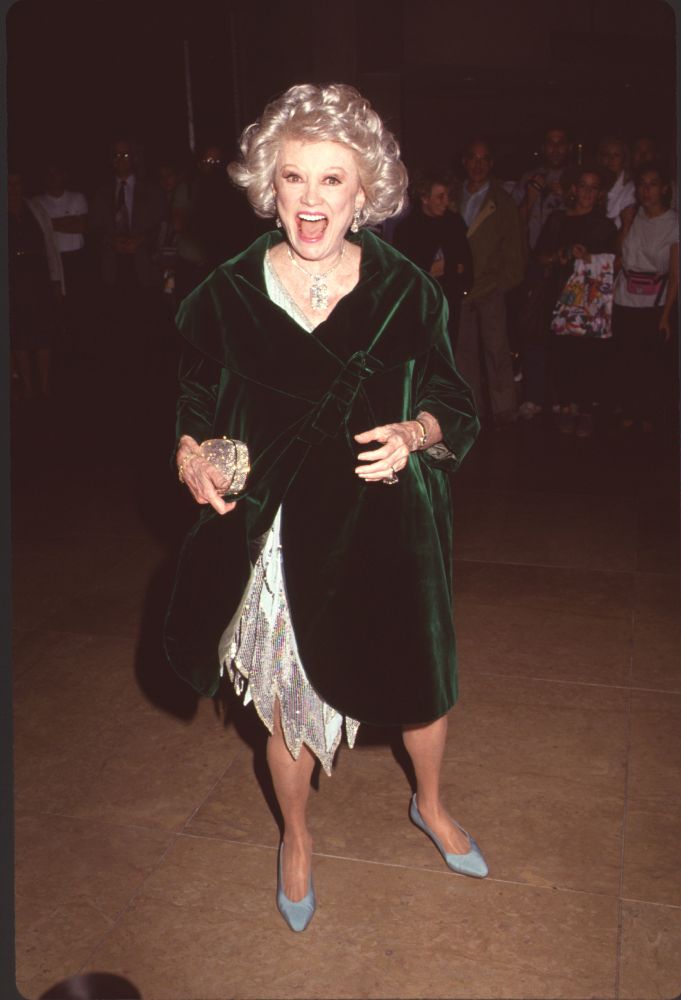 Phyllis Diller photo print in silver dress with green velvet coat