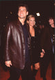 Jim Carrey in leather jacket with Lauren Holly at Get Shorty premiere photo print