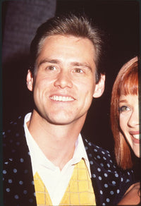 Jim Carrey close-up photo print at The Mask premiere in yellow vest and polka dot jacket.