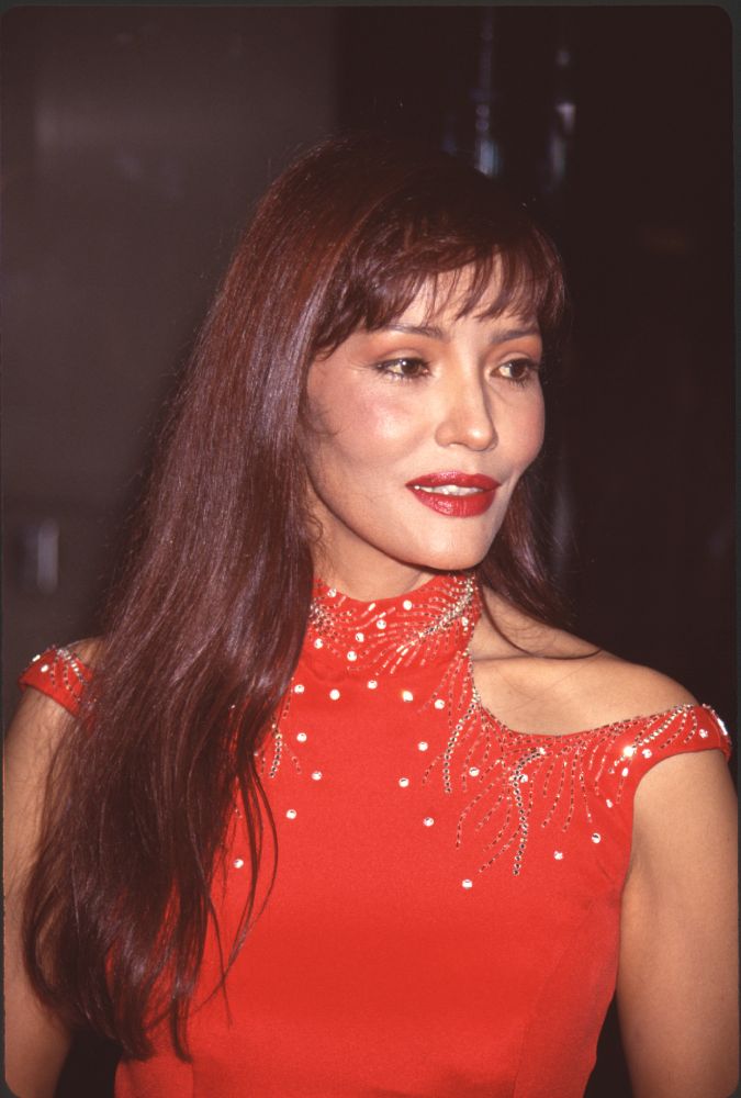 Barbara Carrera close-up photo print in high collar dress at American Cinema Awards