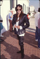 Barbara Carrera stylish photo print in leather pants and jacket at Super Bowl party