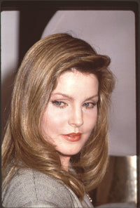 Priscilla Presley close-up photo print in gray blazer.