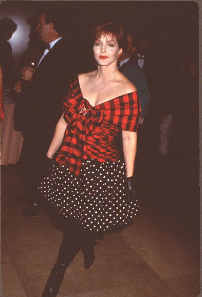 Priscilla Presley in red plaid top and black polka dot skirt photo print.