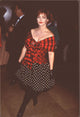 Priscilla Presley in red plaid top and black polka dot skirt photo print.