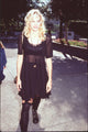 Daryl Hannah photo print in black sheer dress at Children's Museum.