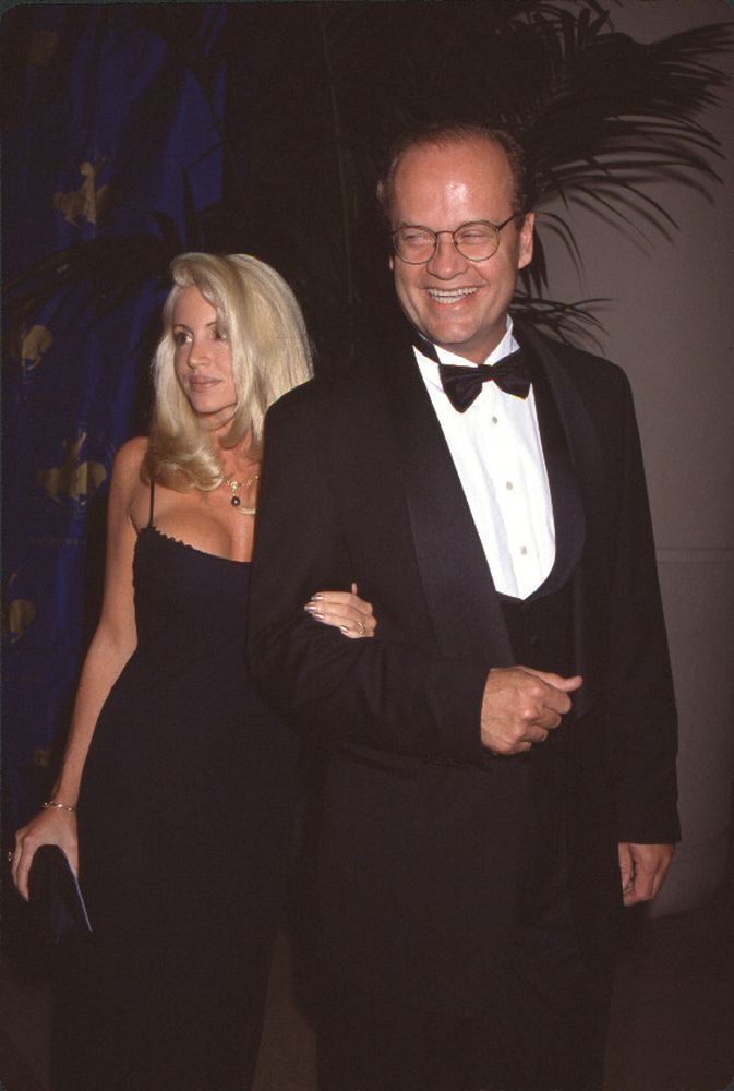 Camille Meyer in black dress and Kelsey Grammer in tuxedo at Carousel of Hope event photo print.