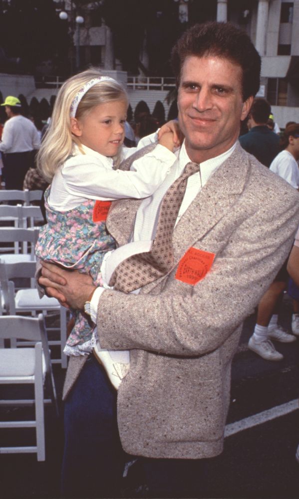 Ted Danson holding daughter Kate photo print in tweed blazer