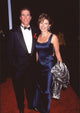 Ted Danson in tuxedo with Mary Steenburgen in navy satin dress at the 23rd People's Choice Awards photo print.