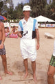 Ted Danson standing on the beach photo print.