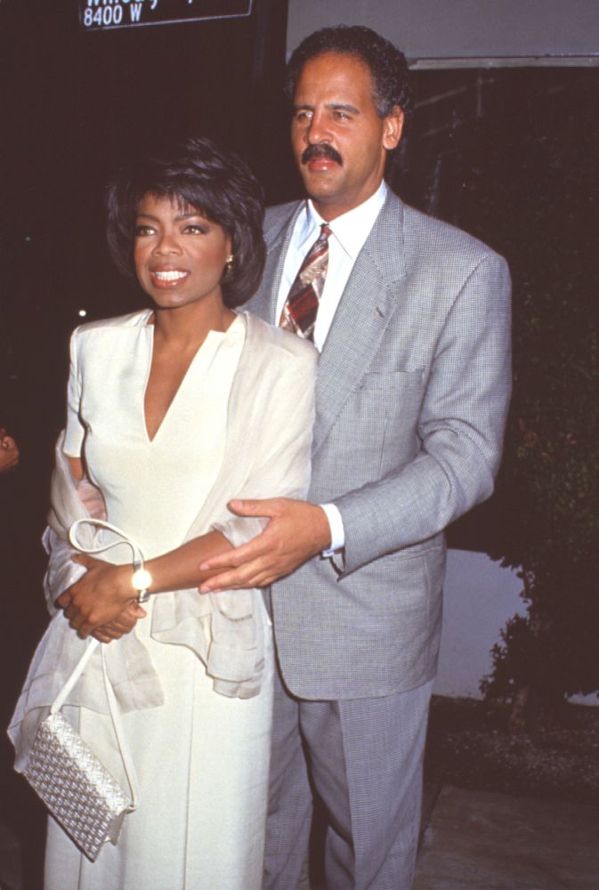 Oprah Winfrey in white outfit and Stedman Graham at 40th birthday celebration photo print.