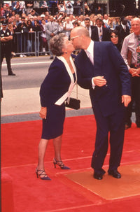 Bruce Willis kissing his mother at hand and footprint ceremony photo print.