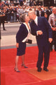 Bruce Willis kissing his mother at hand and footprint ceremony photo print.