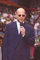 Bruce Willis in double breasted navy suit at Hand and Footprint Ceremony photo print.