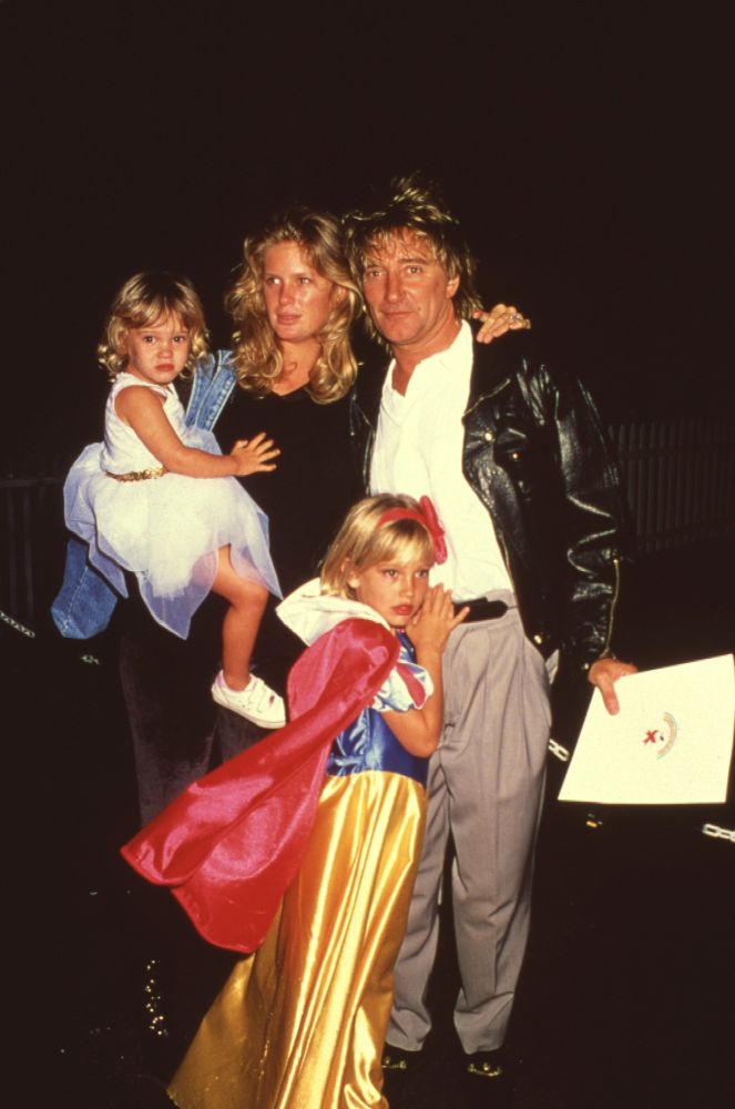 Rachel Hunter and Rod Stewart with daughters at Dream Halloween Party 1994 photo print