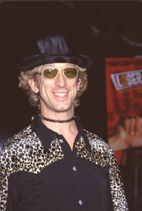 Andy Dick at the Loser Premiere - Photo Print featuring stylish black shirt and fedora.