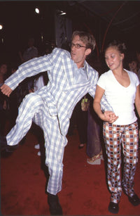 Andy Dick in blue plaid suit with girlfriend at 54 premiere photo print.