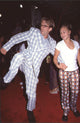 Andy Dick in blue plaid suit with girlfriend at 54 premiere photo print.