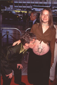 Andy Dick kissing his pregnant girlfriend's belly at Speed 2 premiere photo print.