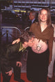 Andy Dick kissing his pregnant girlfriend's belly at Speed 2 premiere photo print.