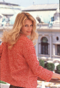 Claudia Schiffer on balcony in pink blazer at 1995 World Music Awards photo print.