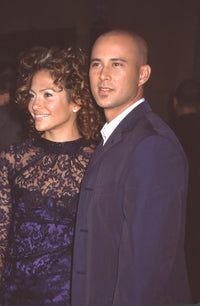 Jennifer Lopez in dark blue lace dress with Chris Judd in navy suit at Angel Eyes premiere photo print