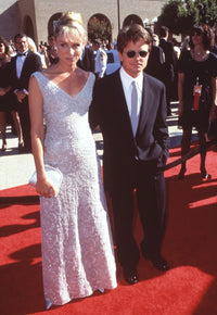 Tracy Pollan in white beaded gown with Michael J. Fox at 50th Emmy Awards photo print.