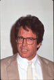 Warren Beatty close up photo print in tan blazer and glasses.