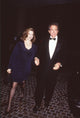 Annette Bening in black long sleeve dress and Warren Beatty in tuxedo photo print.