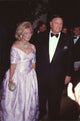 Barbara Davis in pink gown and Marvin Davis in tuxedo at 1992 Carousel of Hope Ball photo print.