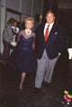 Barbara Davis in Navy and Lace Polka Dot Dress with Marvin Davis in Navy Blazer - Photo Print
