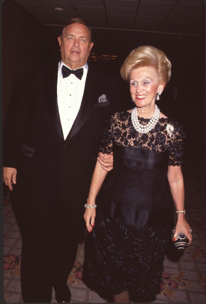 Marvin Davis in tuxedo and Barbara Davis in black lace dress photo print