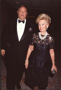 Marvin Davis in tuxedo and Barbara Davis in black lace dress photo print