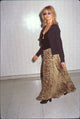 Goldie Hawn wearing an animal print skirt at LAX - Photo Print