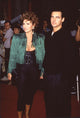 Raquel Welch in green tassle jacket and black pants with her son Damon Welch photo print.