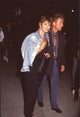 Raquel Welch in black outfit and denim jacket photo print