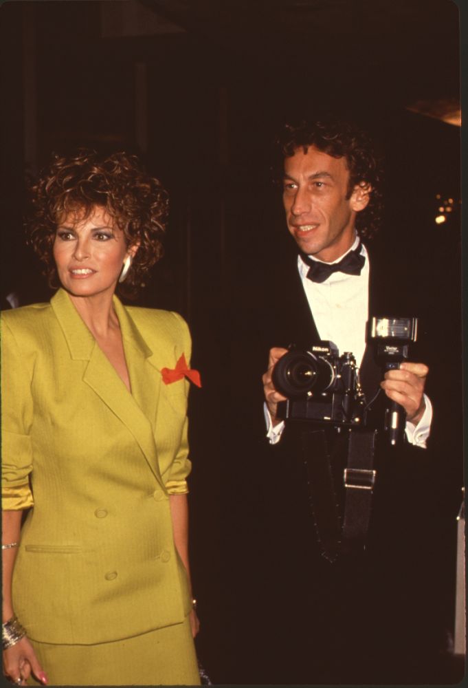 Raquel Welch in green suit with red ribbon pin photo print by Andr&eacute; Weinfeld.
