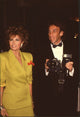 Raquel Welch in green suit with red ribbon pin photo print by Andr&eacute; Weinfeld.