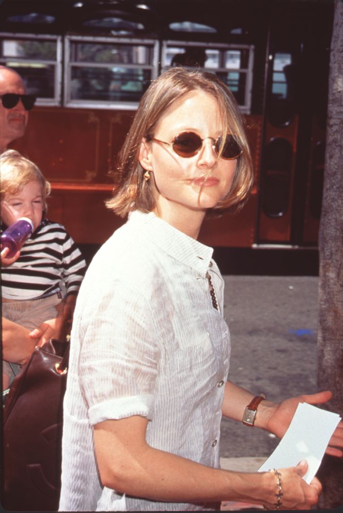 Jodie Foster at Pocahontas Premiere in sheer white button down and sunglasses