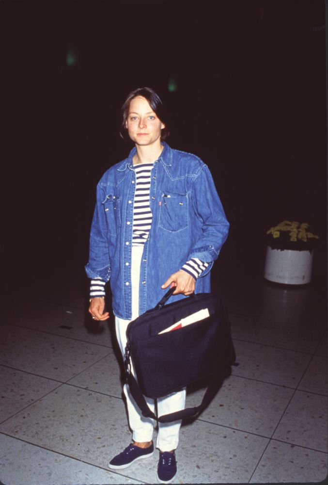 Jodie Foster photo print in striped shirt and denim jacket at LAX